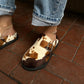 WOMEN'S COW PRINT MULES CLOGS