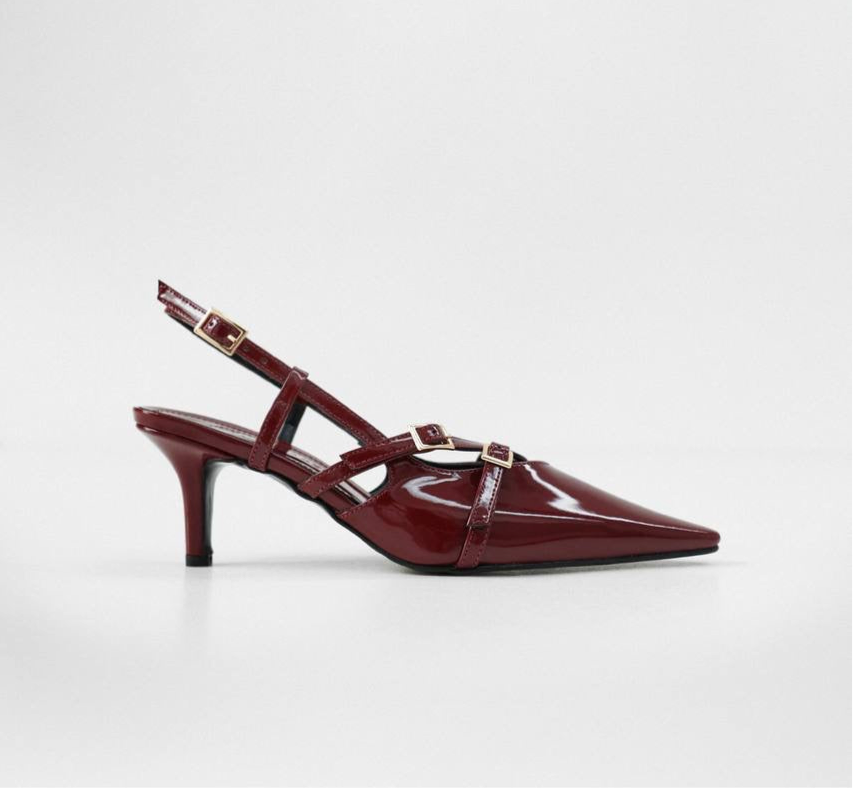 Blade embellished patent-leather slingback pumps