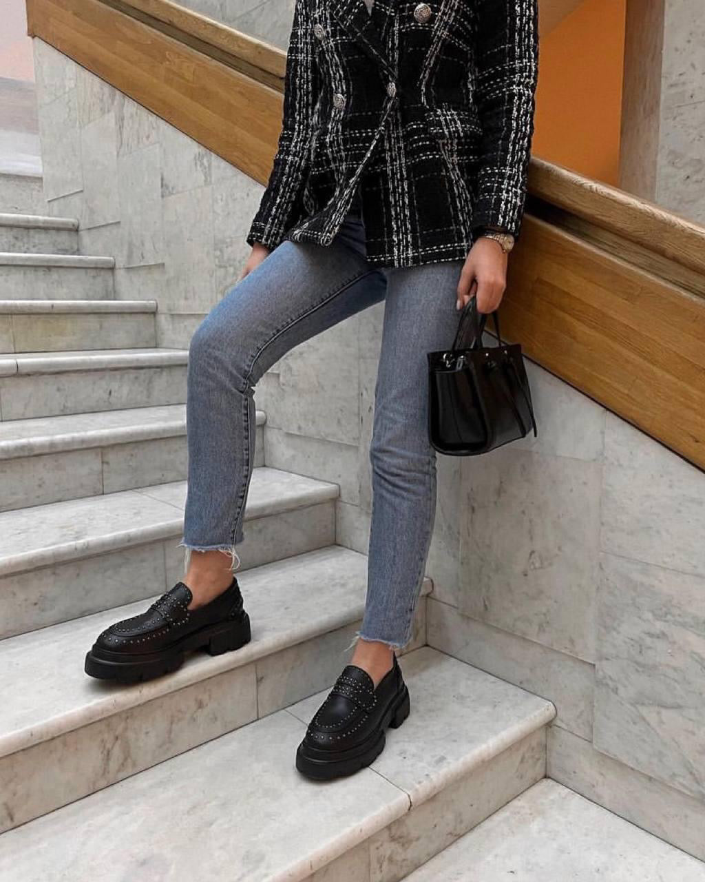 Chunky black loafers with studs