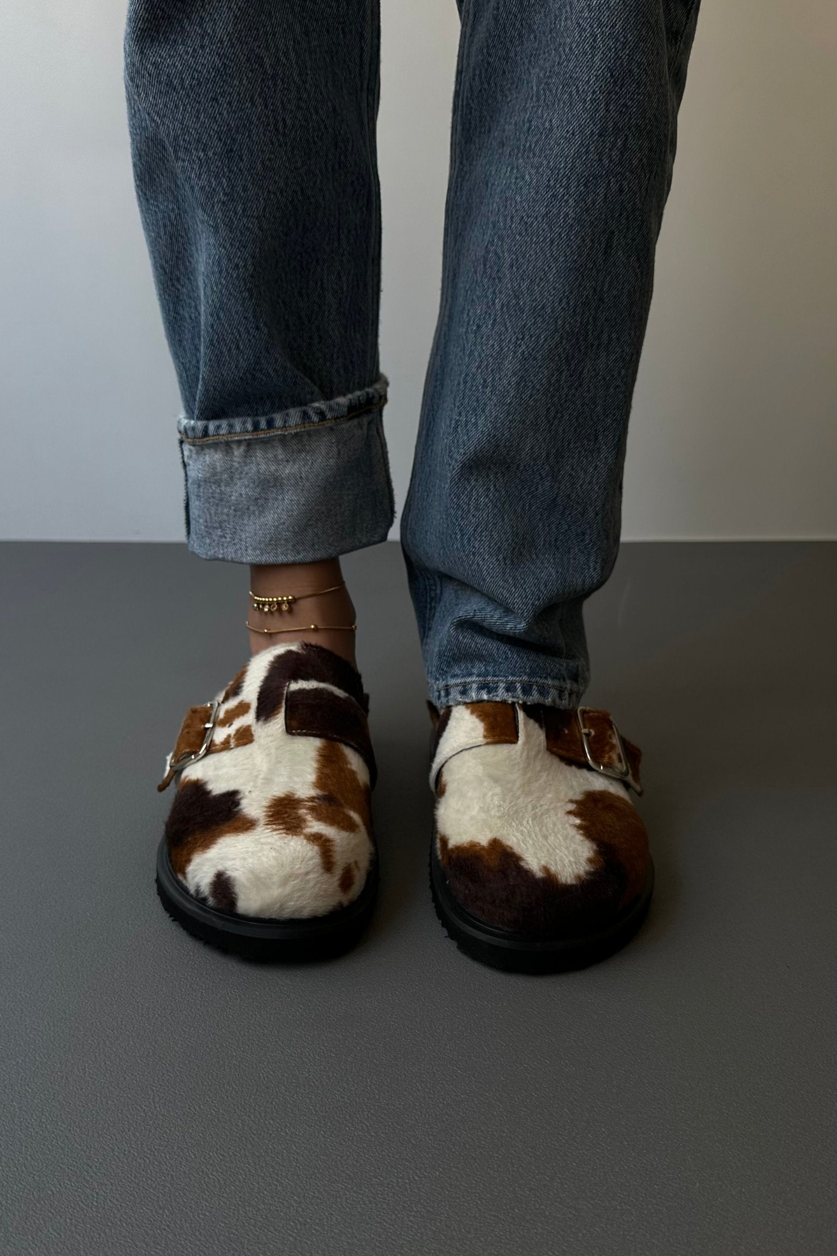 WOMEN'S COW PRINT MULES CLOGS