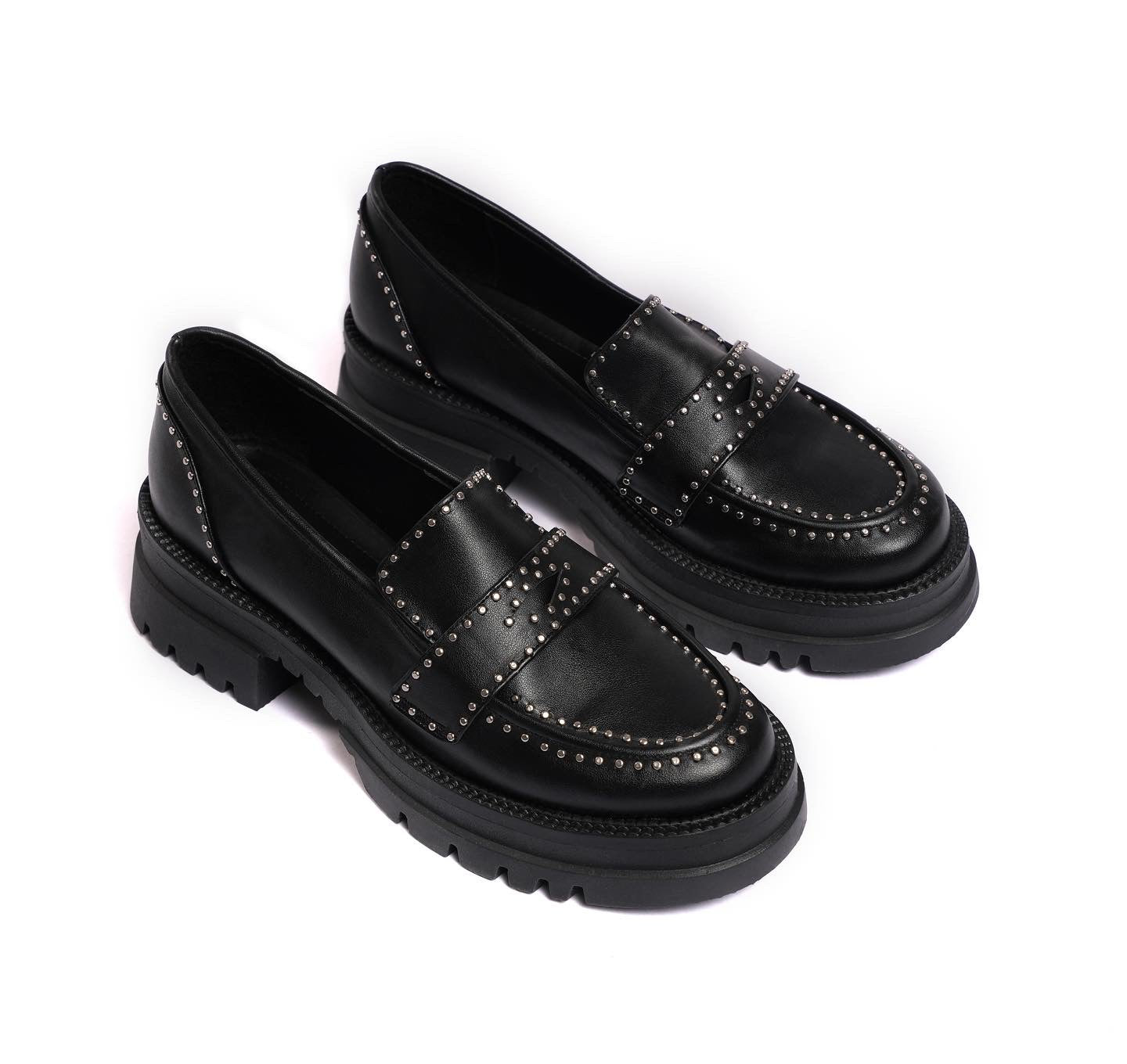 Chunky black loafers with studs